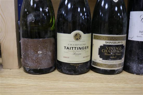 Four bottles of mixed champagnes and one bottle of Creme de Cassis